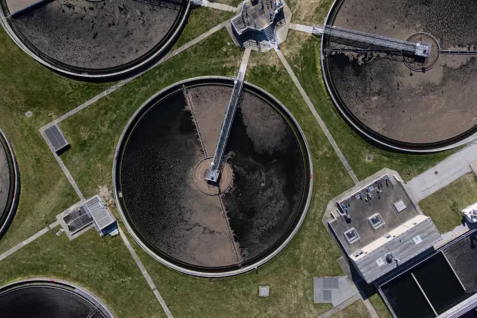 Bird-s eye view of circular retention tanks at water treatment plant